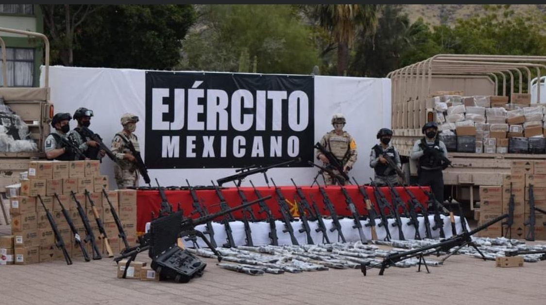 Ejto. Mexicano G.N. y la F.G.R. aseguran cuatro inmuebles armas cartuchos equipo tactico droga y vehiculos en operativo conjunto